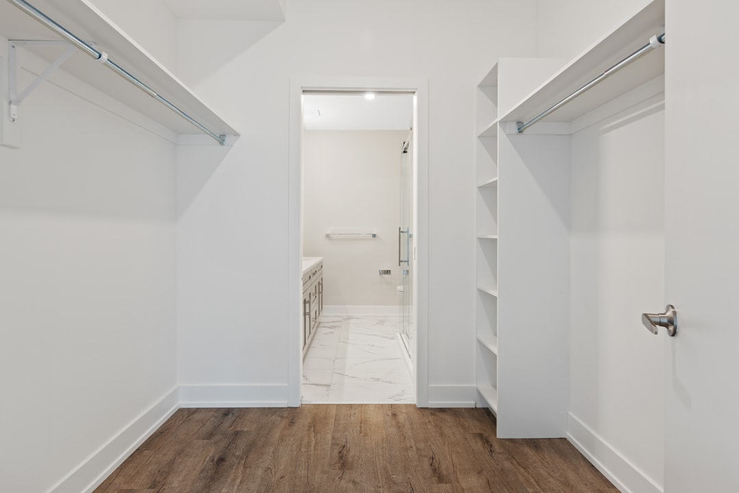 white-wooden-door-on-brown-wooden-parquet-floor-e5-j-hzpmkw